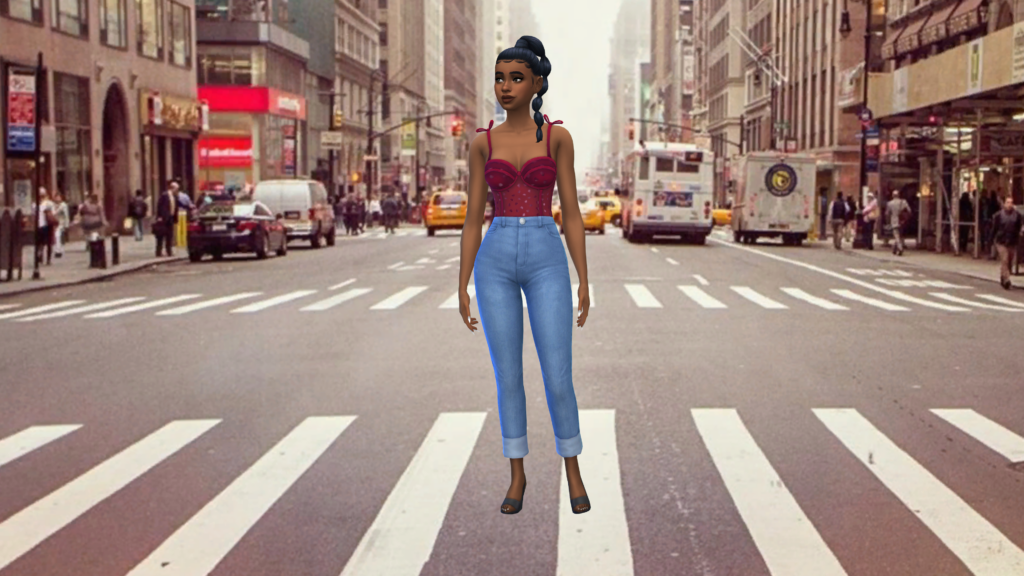 Un sim en jean taille haute bleu et un body corset rouge avec les cheveux tressés. Le sim se tient au milieu d'un passage piéton dans une grande ville.