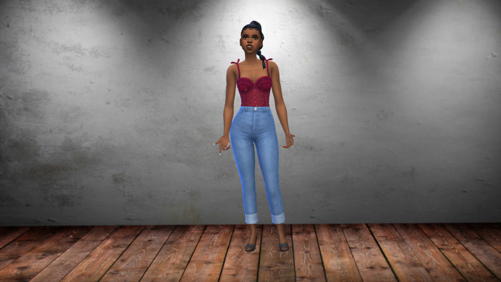 Un sim en jean taille haute bleu et un body corset rouge avec les cheveux tressés. Le fond d'écran CAO Sims 4 pour ce sim est un sol en planches de bois et un mur gris grunge.
