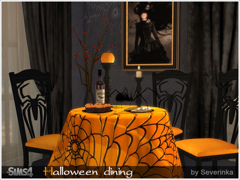 une nappe orange avec des toiles d'araignées et des chaises araignées autour