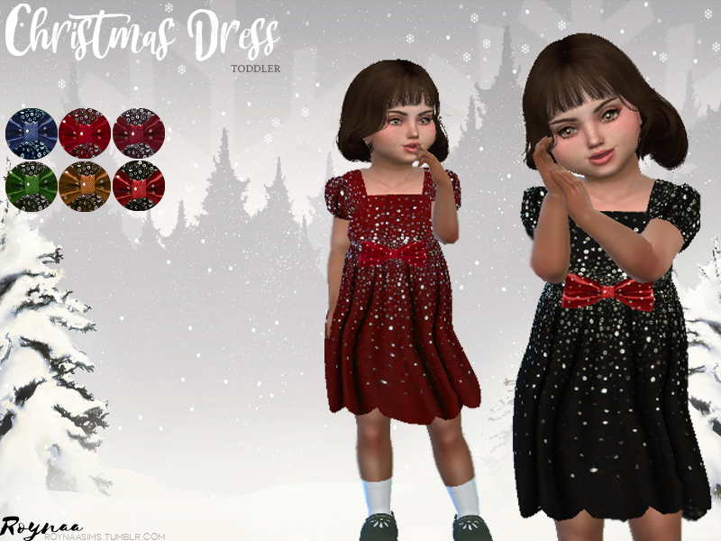 Un tout-petit dans Les Sims 4 avec des cheveux bruns et des yeux marron. Ce Sim porte une robe de Noël personnalisée.