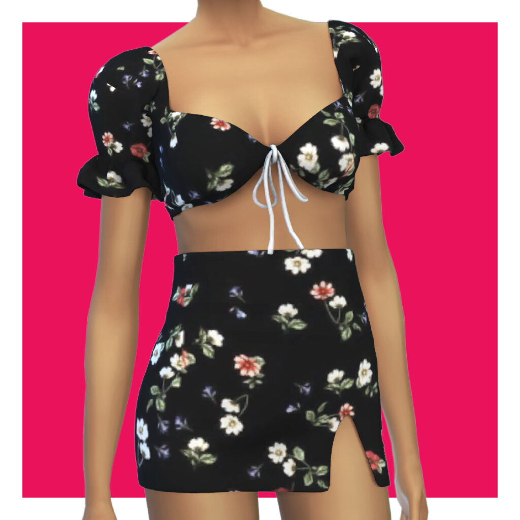 Un sim sur un fond rose portant un ensemble à deux pièces avec une jupe et un haut imprimé noir avec des motifs floraux.
