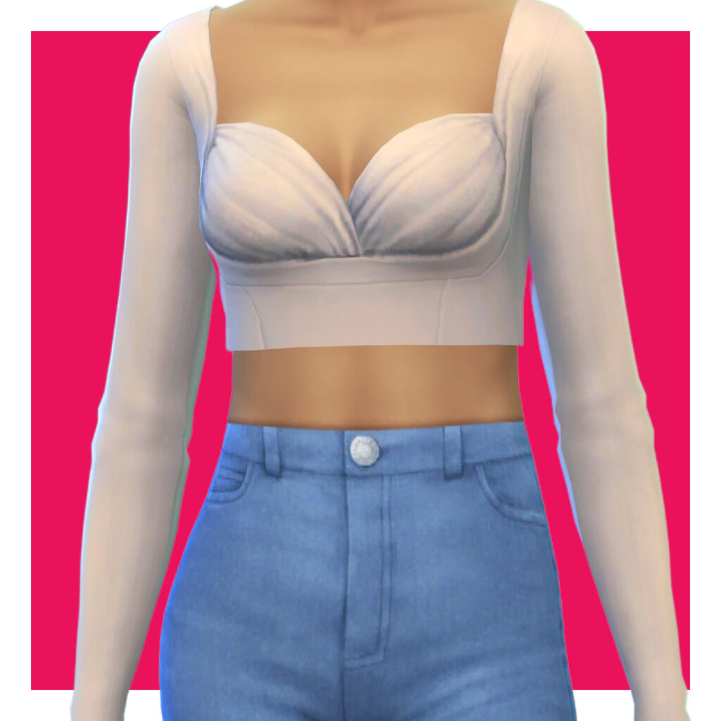 Un sim sur un fond rose portant un jean avec un haut de récolte beige