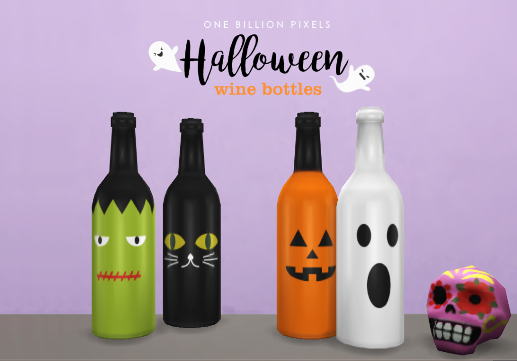 Une bouteille de vin décorée avec des choses d'Halloween comme des chats, des fantômes et plus encore.