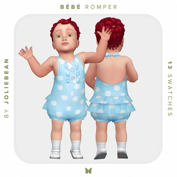 Un fond gris avec une bordure blanche. Il y a un bébé dans une barboteuse bleue portant des chaussettes et ayant les cheveux rouges.