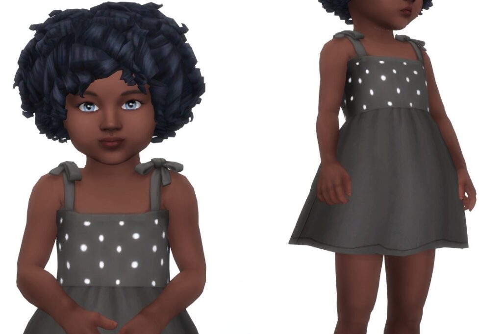 Un enfant en bas âge des Sims 4 avec des cheveux bouclés et portant une robe noire avec des pois blancs sur le haut.