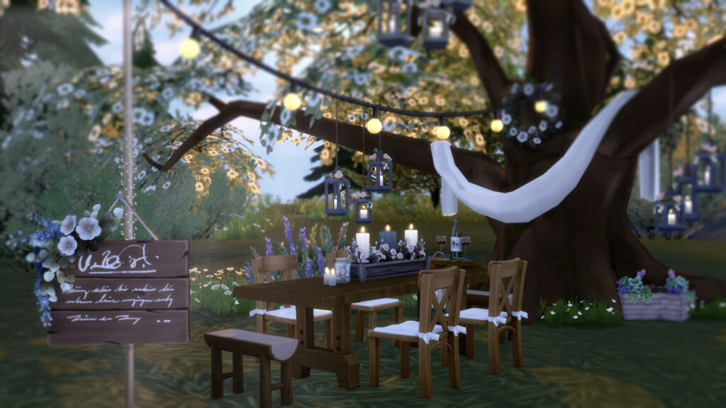 Capture d'écran de The Sims 4 avec un grand arbre en arrière-plan recouvert de tissu. Il y a une table couverte de décorations de mariage pour les sims 4 devant.