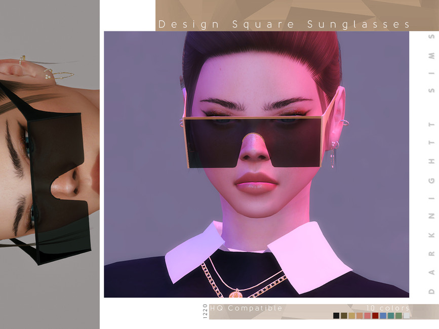 Un Sim portant un pull noir sur une chemise blanche, les cheveux relevés en chignon et portant une paire de lunettes carrées noires et dorées.