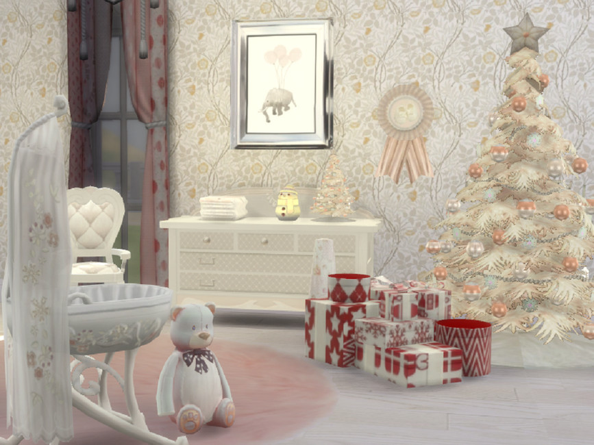 Une chambre de bébé de couleur pêche claire et crème décorée pour Noël.