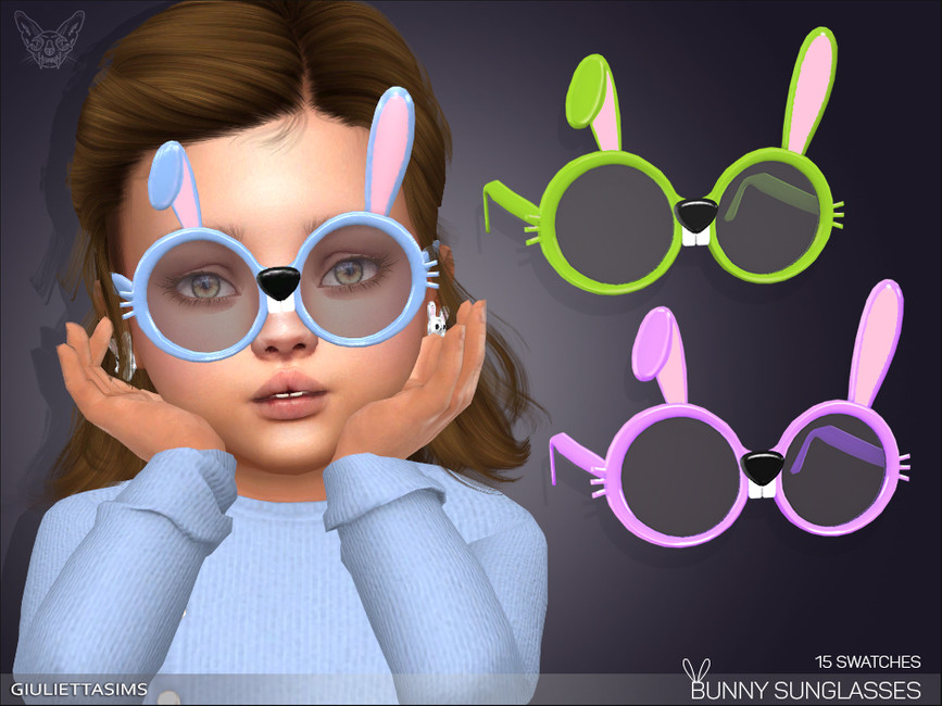 Un Sim aux cheveux bruns avec une raie sur le côté, portant un pull bleu clair et une paire de lunettes de soleil bleues qui lui donnent l'apparence d'un lapin.