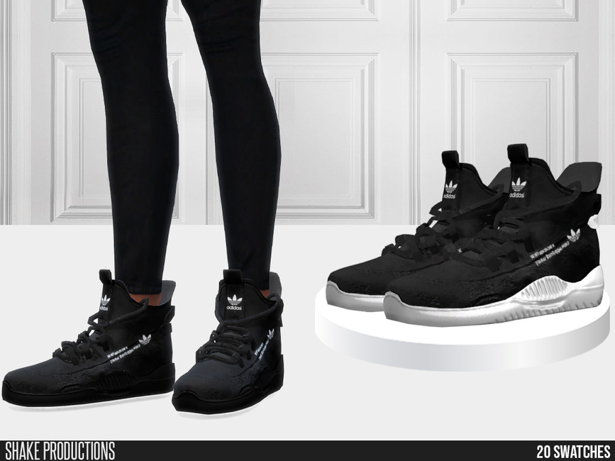 Une paire de jambes avec des baskets Adidas montantes