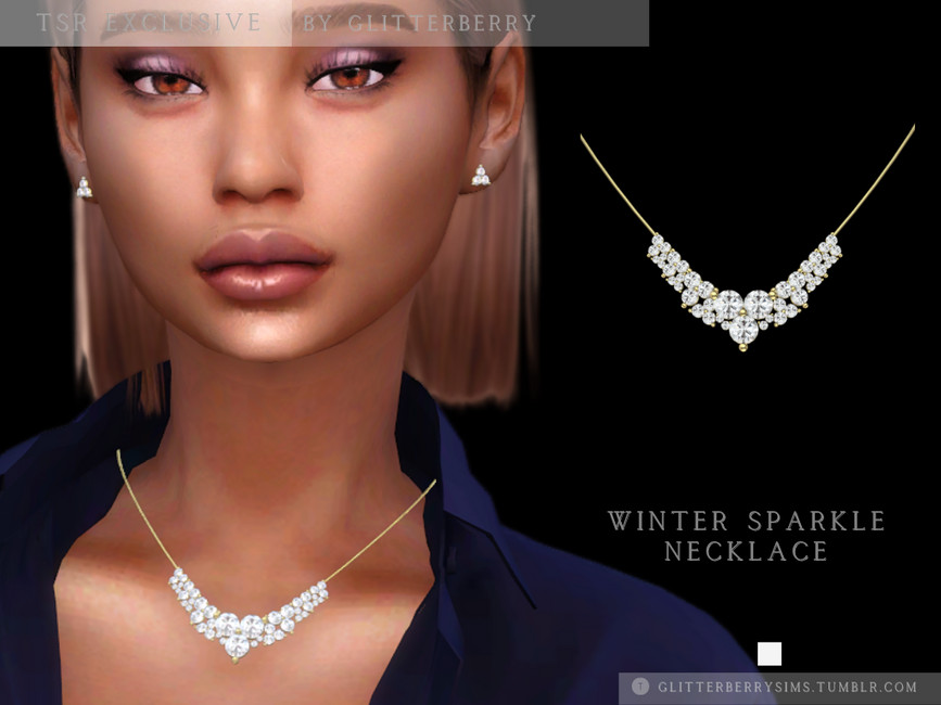 Un sim avec une chemise à col bleu portant un collier en or avec des diamants.