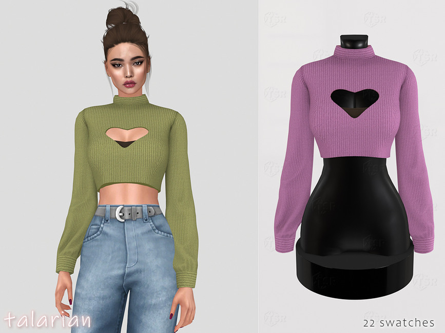 Un sim portant un jean taille haute bleu et un pull crop vert avec un cœur découpé au centre.